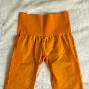 NVGTN orange leggings XS